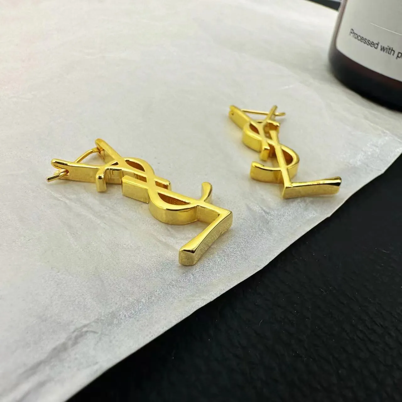 metallic glossy small fragrance letter earrings